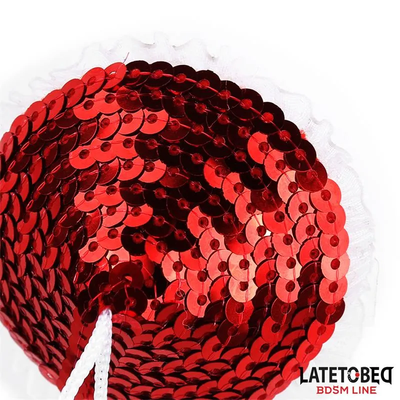 Pezoneras con Lentejuelas Rojas y Pompones Blancos · LATETOBED BDSM LINE · Pinzas y Pezoneras — photo 4